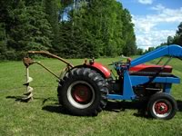 The MF 135 gets ready to dig
