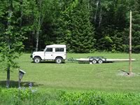 The Land Rover brings the poles on the trailer