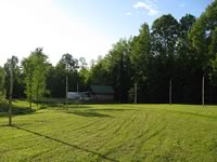 The long view of 6 poles in 2 arched rows