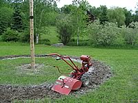 This is where the vintage Troy rototiller comes in handy